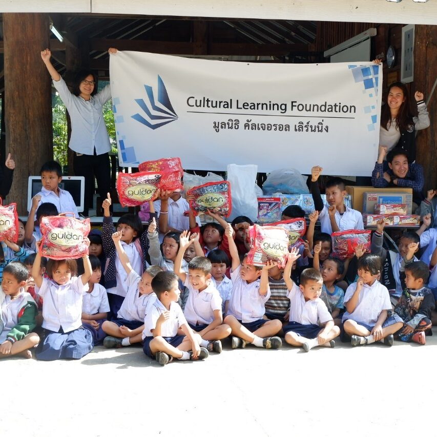 The Hug Nong project distributing packages to Thai children